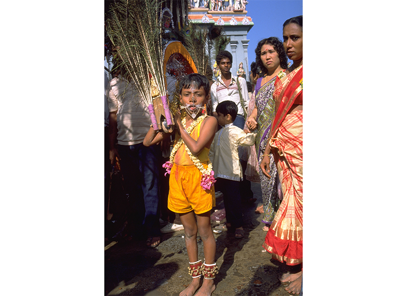 A child with a thol kavadi, which is carried on the shoulder, 1984. Ministry of Information and the Arts Collection, courtesy of National Archives of Singapore.